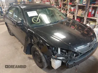 2003 Toyota Camry LE with VIN 4T1BE32K33U171859, listed as a IAAI auction lot 41938515 with 213,447 mi miles and . Bid and sale history available at DreamBid. Image 6.