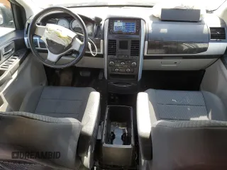 2010 Dodge Grand Caravan Crew with VIN 2D4RN6DX3AR435026, listed as a Copart auction lot 48490085 with 179,114 mi miles and Salvage Title. Bid and sale history available at DreamBid. Image 8.