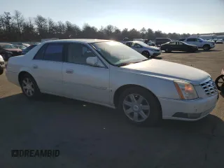 2007 Cadillac DTS V8 z VIN 1G6KD57Y27U208554, wystawiony jako Copart lot #88748645 z przebiegiem 80 341 mil mil oraz Tytuł czysty. Historia ofert i sprzedaży dostępna na DreamBid. Obrazek 4.
