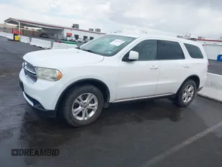 2013 Dodge Durango SXT with VIN 1C4RDJAG7DC659050, listed as a IAAI auction lot 42637236 with 162,458 mi miles and . Bid and sale history available at DreamBid. Image 14.