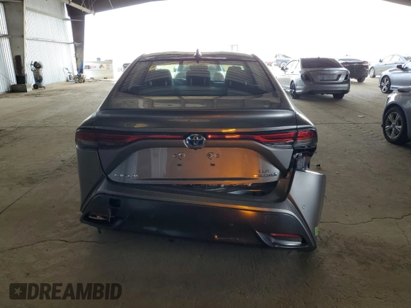 2022 Toyota Mirai XLE with VIN JTDAAAAAXNA007389, listed as a Copart auction lot 58393325 with 27,317 mi miles and Salvage title. Bid and sale history available at DreamBid. Image 6.