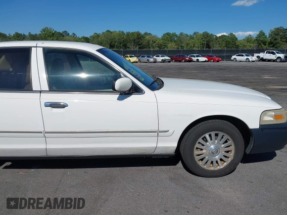 2006 Mercury Grand Marquis LS Premium z VIN 2MEFM75V46X614439, wystawiony jako IAAI lot #42319947 z przebiegiem 125 715 mil mil oraz . Historia ofert i sprzedaży dostępna na DreamBid. Obrazek 13.