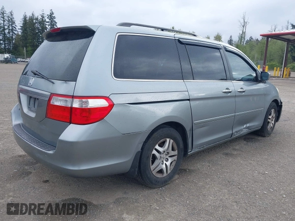 2007 Honda Odyssey EX-L with VIN 5FNRL38777B075985, listed as a IAAI auction lot 42083450 with 127,622 mi miles. Bid and sale history available at carsss.com. Image 4.