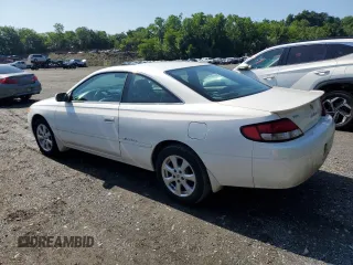 2000 Toyota Solara SE z VIN 2T1CF28P2YC378976, wystawiony jako Copart lot #61400195 z przebiegiem 197 090 mil mil oraz Czysty tytuł • Clean title. Historia ofert i sprzedaży dostępna na DreamBid. Obrazek 2.