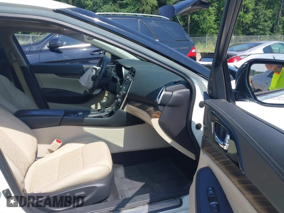 2017 Nissan Maxima S with VIN 1N4AA6APXHC371182, listed as a IAAI auction lot 42596000 with 159,710 mi miles and . Bid and sale history available at DreamBid. Image 5.