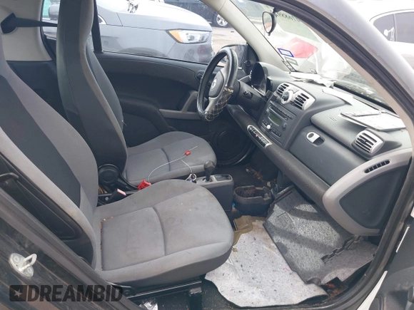 2010 Smart fortwo Pure with VIN WMEEJ3BA5AK390904, listed as a IAAI auction lot 41688922 with Not provided miles and . Bid and sale history available at DreamBid. Image 5.