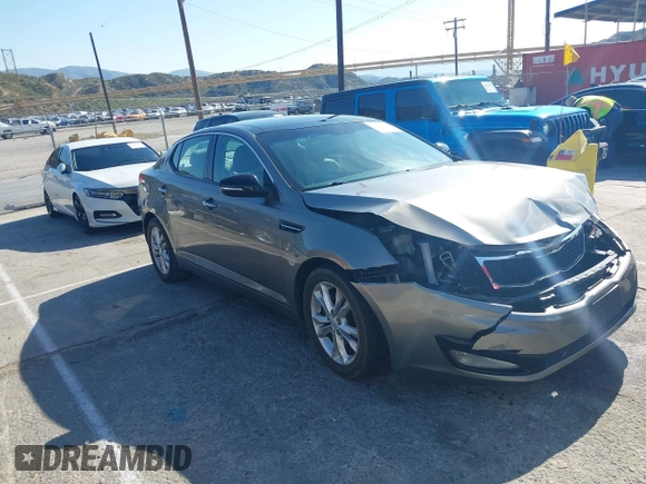 2013 Kia Optima EX z VIN 5XXGN4A70DG252497, wystawiony jako IAAI lot #42145025 z przebiegiem 90 867 mil mil oraz . Historia ofert i sprzedaży dostępna na DreamBid. Obrazek 1.