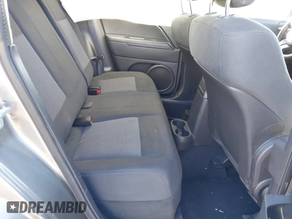 2013 Jeep Patriot Latitude with VIN 1C4NJPFA1DD169521, listed as a IAAI auction lot 41812936 with 133,088 mi miles. Bid and sale history available at carsss.com. Image 8.