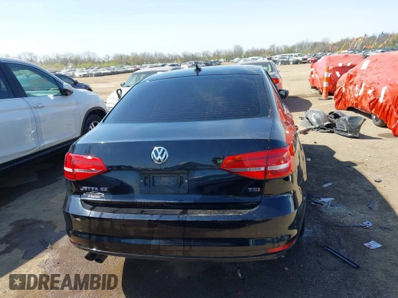 2015 Volkswagen Jetta SE z VIN 3VWD17AJ2FM318882, wystawiony jako IAAI lot #42041914 z przebiegiem 97 623 mil mil oraz . Historia ofert i sprzedaży dostępna na DreamBid. Obrazek 16.