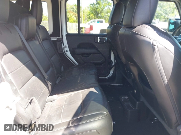 2020 Jeep Wrangler Unlimited Sahara with VIN 1C4HJXEN4LW330867, listed as a IAAI auction lot 41790709 with 63,151 mi miles. Bid and sale history available at carsss.com. Image 8.
