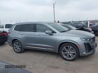 2025 Cadillac XT6 FWD Premium Luxury with VIN 1GYKPCRS4SZ119978, listed as a IAAI auction lot 41877109 with 13,579 mi miles. Bid and sale history available at carsss.com. Image 13.
