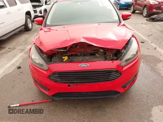 2017 Ford Focus SE with VIN 1FADP3FE8HL328221, listed as a IAAI auction lot 41813348 with 76,400 mi miles and . Bid and sale history available at carsss.com. Image 6.