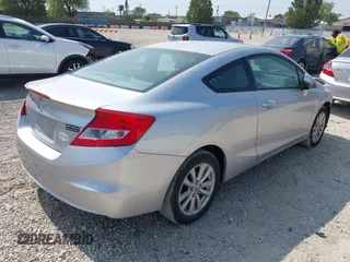 2012 Honda Civic Cpe EX with VIN 2HGFG3B83CH514615, listed as a IAAI auction lot 40324098 with 106,077 mi miles. Bid and sale history available at carsss.com. Image 4.