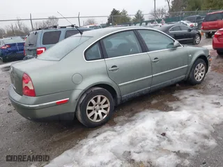 2003 Volkswagen Passat GLS with VIN WVWPD63B33E022262, listed as a IAAI auction lot 41466620 with 249,726 mi miles. Bid and sale history available at carsss.com. Image 4.