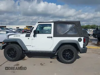 2015 Jeep Wrangler Willys Wheeler with VIN 1C4AJWAG0FL562536, listed as a IAAI auction lot 42384747 with 103,507 mi miles and . Bid and sale history available at DreamBid. Image 14.