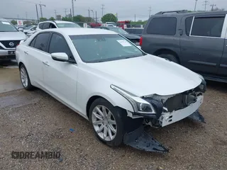 2015 Cadillac CTS Luxury RWD z VIN 1G6AR5S32F0123986, wystawiony jako IAAI lot #41853734 z przebiegiem 108 043 mil mil oraz . Historia ofert i sprzedaży dostępna na DreamBid. Obrazek 1.