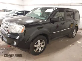 2009 Honda Pilot Touring with VIN 5FNYF48939B041166, listed as a IAAI auction lot 42098397 with 228,305 mi miles and . Bid and sale history available at carsss.com. Image 2.