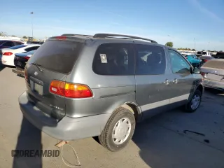 1999 Toyota Sienna CE with VIN 4T3ZF19C2XU100132, listed as a Copart auction lot 75251124 with 217,399 mi miles and Salvage Title. Bid and sale history available at carsss.com. Image 3.