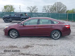 2015 Toyota Avalon Limited with VIN 4T1BK1EB9FU177047, listed as a IAAI auction lot 41971667 with 100,811 mi miles and . Bid and sale history available at DreamBid. Image 14.