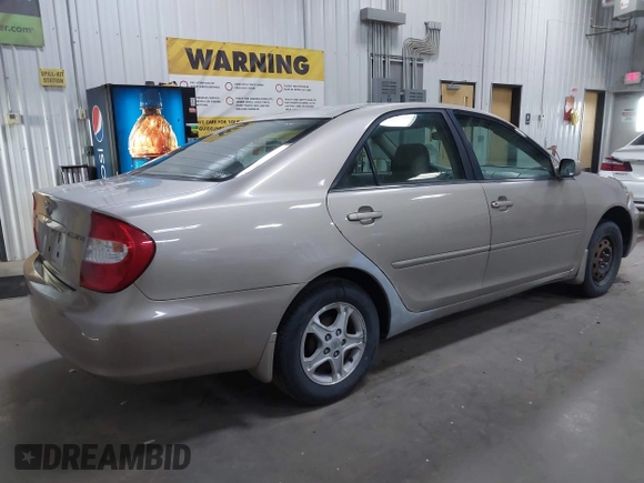 2004 Toyota Camry LE with VIN 4T1BE32K24U852256, listed as a IAAI auction lot 42036477 with 154,389 mi miles. Bid and sale history available at carsss.com. Image 4.