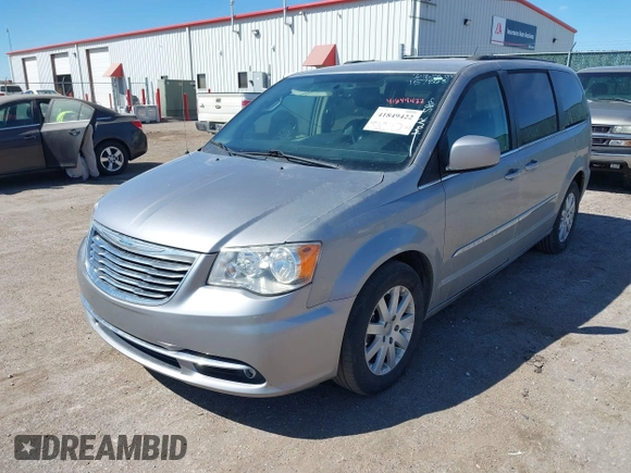 2016 Chrysler Town & Country Touring with VIN 2C4RC1BG7GR157863, listed as a IAAI auction lot 41849422 with 218,936 mi miles and . Bid and sale history available at DreamBid. Image 2.