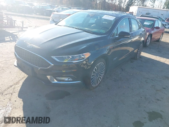 2017 Ford Fusion Titanium with VIN 3FA6P0SU2HR309895, listed as a IAAI auction lot 40963527 with 80,761 mi miles and . Bid and sale history available at DreamBid. Image 17.