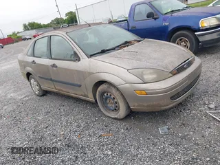 2003 Ford Focus LX z VIN 1FAFP33P83W271153, wystawiony jako IAAI lot #42360855 z przebiegiem 178 711 mil mil oraz . Historia ofert i sprzedaży dostępna na DreamBid. Obrazek 1.
