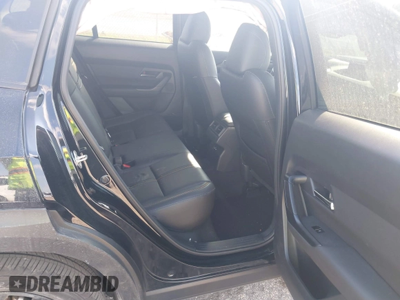 2023 Mazda CX-50 S Premium Plus with VIN 7MMVABEM1PN141344, listed as a IAAI auction lot 41473823 with 12,120 mi miles and . Bid and sale history available at DreamBid. Image 8.