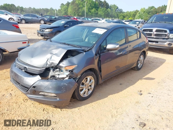 2010 Honda Insight EX with VIN JHMZE2H74AS027020, listed as a IAAI auction lot 42394875 with 248,003 mi miles and . Bid and sale history available at DreamBid. Image 2.