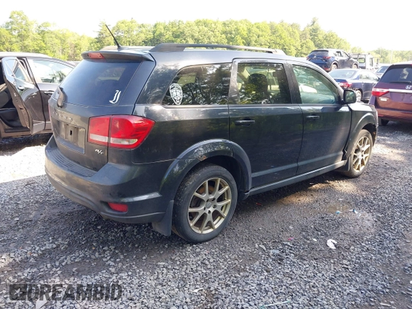 2013 Dodge Journey R/T with VIN 3C4PDDEG4DT691056, listed as a IAAI auction lot 42535196 with 198,307 mi miles and . Bid and sale history available at DreamBid. Image 4.