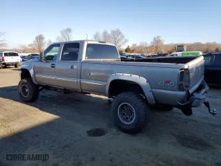 2002 GMC Sierra 2500HD SLE with VIN 1GTHK23U82F243580, listed as a Copart auction lot 82602404 with 156,832 mi miles and Salvage Title. Bid and sale history available at carsss.com. Image 2.