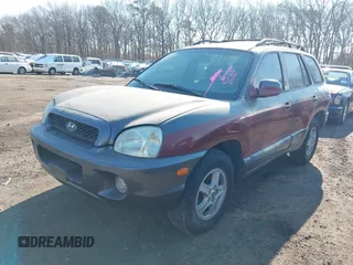 2004 Hyundai Santa Fe GLS with VIN KM8SC13E34U708007, listed as a IAAI auction lot 41414729 with 999,999 mi miles. Bid and sale history available at carsss.com. Image 2.