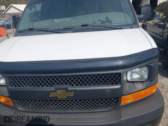 2014 Chevrolet Express Cargo Van with VIN 1GCWGFCA8E1199409, listed as a IAAI auction lot 41936092 with 304,367 mi miles. Bid and sale history available at carsss.com. Image 12.