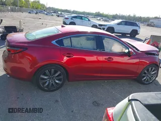 2018 Mazda 6 Grand Touring with VIN JM1GL1TY1J1302146, listed as a IAAI auction lot 41788881 with 55,852 mi miles and . Bid and sale history available at DreamBid. Image 14.