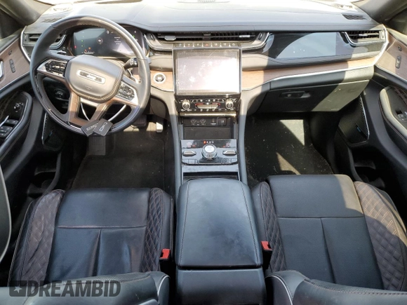 2023 Jeep Grand Cherokee Summit Reserve z VIN 1C4RJYE62PC652630, wystawiony jako Copart lot #55110525 z przebiegiem 21 186 mil mil oraz Szkoda całkowita • Salvage title. Historia ofert i sprzedaży dostępna na DreamBid. Obrazek 8.