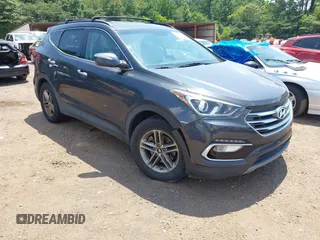 2018 Hyundai Santa Fe 2.4L with VIN 5XYZU3LBXJG561781, listed as a IAAI auction lot 42683478 with 135,527 mi miles and . Bid and sale history available at DreamBid. Image 1.