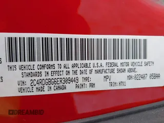 2014 Dodge Grand Caravan American Value with VIN 2C4RDGBG6ER309449, listed as a IAAI auction lot 42148824 with 198,532 mi miles and . Bid and sale history available at DreamBid. Image 9.