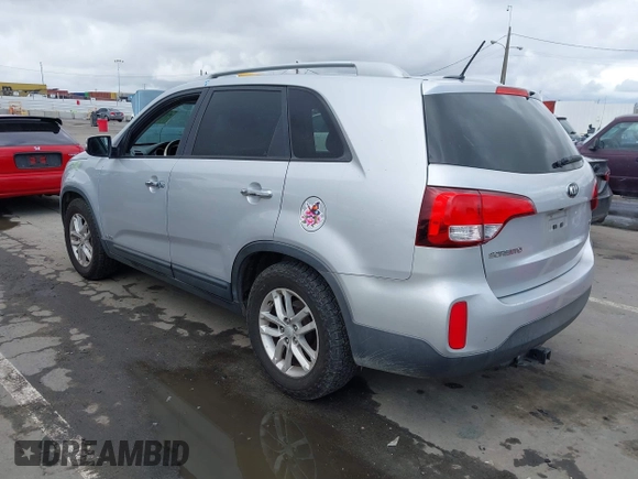 2014 Kia Sorento LX with VIN 5XYKTCA69EG496907, listed as a IAAI auction lot 41789120 with 166,644 mi miles and . Bid and sale history available at carsss.com. Image 3.