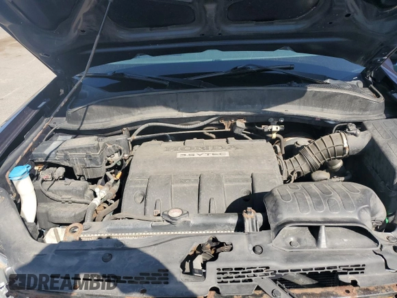 2012 Honda Ridgeline RTL with VIN 5FPYK1F54CB452813, listed as a Copart auction lot 62020825 with 79,176 mi miles and Salvage title. Bid and sale history available at DreamBid. Image 11.