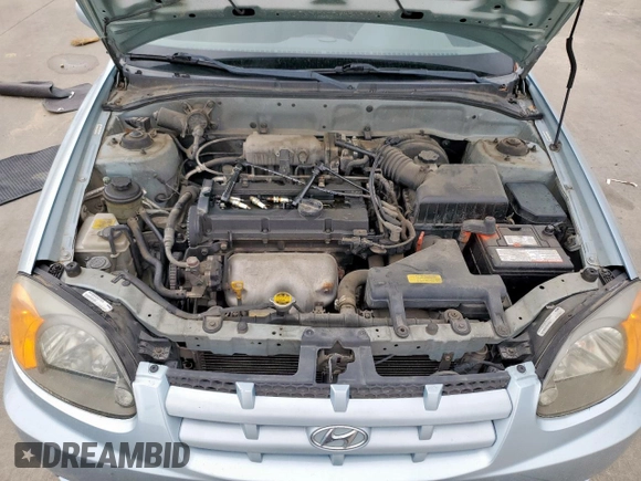 2003 Hyundai Accent GL z VIN KMHCG45C73U481294, wystawiony jako Copart lot #55958005 z przebiegiem 136 964 mil mil oraz Czysty tytuł • Clean title. Historia ofert i sprzedaży dostępna na DreamBid. Obrazek 11.