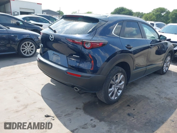 2023 Mazda CX-30 S Carbon Edition with VIN 3MVDMBCM4PM542160, listed as a IAAI auction lot 42175395 with 11,340 mi miles and . Bid and sale history available at DreamBid. Image 4.
