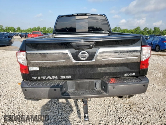 2017 Nissan Titan Platinum Reserve with VIN 1N6BA1F43HN568650, listed as a Copart auction lot 59593525 with 126,193 mi miles and Salvage title. Bid and sale history available at DreamBid. Image 6.
