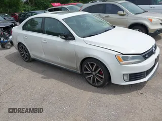 2012 Volkswagen Jetta GLI Autobahn z VIN 3VW4A7AJ3CM409073, wystawiony jako IAAI lot #42360786 z przebiegiem 208 712 mil mil oraz . Historia ofert i sprzedaży dostępna na DreamBid. Obrazek 1.