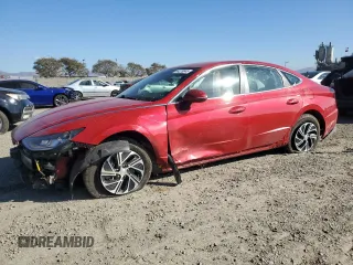 2021 Hyundai Sonata Hybrid Blue with VIN KMHL24JJ1MA035423, listed as a Copart auction lot 44228045 with 65,072 mi miles and Salvage Title. Bid and sale history available at carsss.com. Image 1.