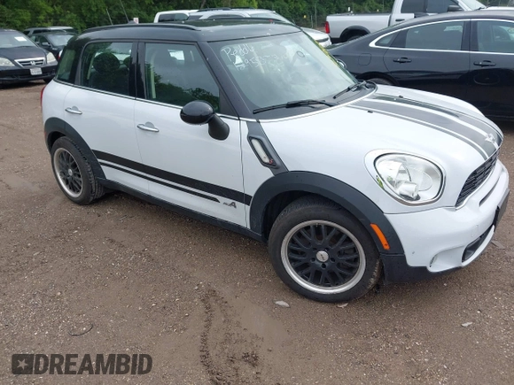 2014 MINI Countryman S z VIN WMWZC5C5XEWP37470, wystawiony jako IAAI lot #42396984 z przebiegiem 77 847 mil mil oraz . Historia ofert i sprzedaży dostępna na DreamBid. Obrazek 1.