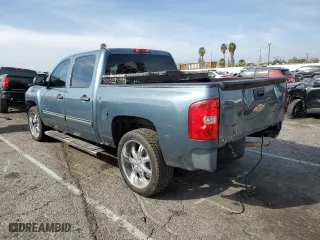 2009 Chevrolet Silverado 1500 LS with VIN 3GCEC13C89G125989, listed as a Copart auction lot 43618815 with 214,769 mi miles and Salvage Title. Bid and sale history available at carsss.com. Image 2.