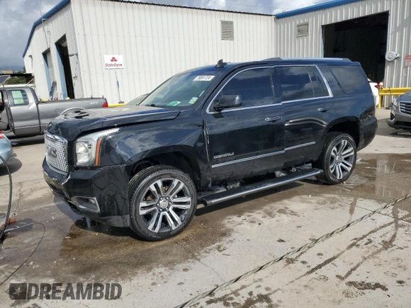 2017 GMC Yukon Denali with VIN 1GKS1CKJ7HR261831, listed as a Copart auction lot 79091724 with 156,082 mi miles and Salvage Title. Bid and sale history available at carsss.com. Image 1.