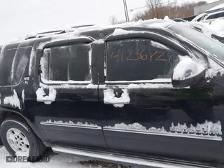 2012 Chevrolet Suburban LTZ with VIN 1GNSKKE75CR215742, listed as a IAAI auction lot 41236729 with 250,634 mi miles. Bid and sale history available at carsss.com. Image 12.