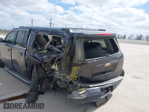 2015 Chevrolet Suburban LTZ with VIN 1GNSCKKC9FR500933, listed as a IAAI auction lot 41830980 with 169,217 mi miles and . Bid and sale history available at DreamBid. Image 6.