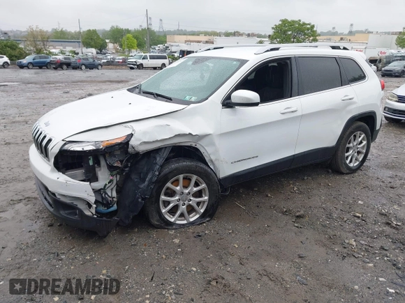 2016 Jeep Cherokee Altitude with VIN 1C4PJMCB8GW372242, listed as a IAAI auction lot 42214287 with 87,597 mi miles and . Bid and sale history available at DreamBid. Image 2.